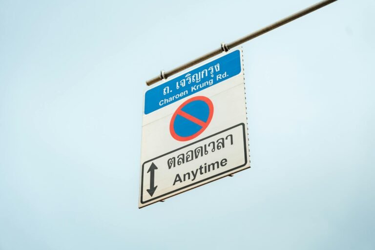 Street sign on Charoen Krung Road in Bangkok, highlighting no stopping anytime.